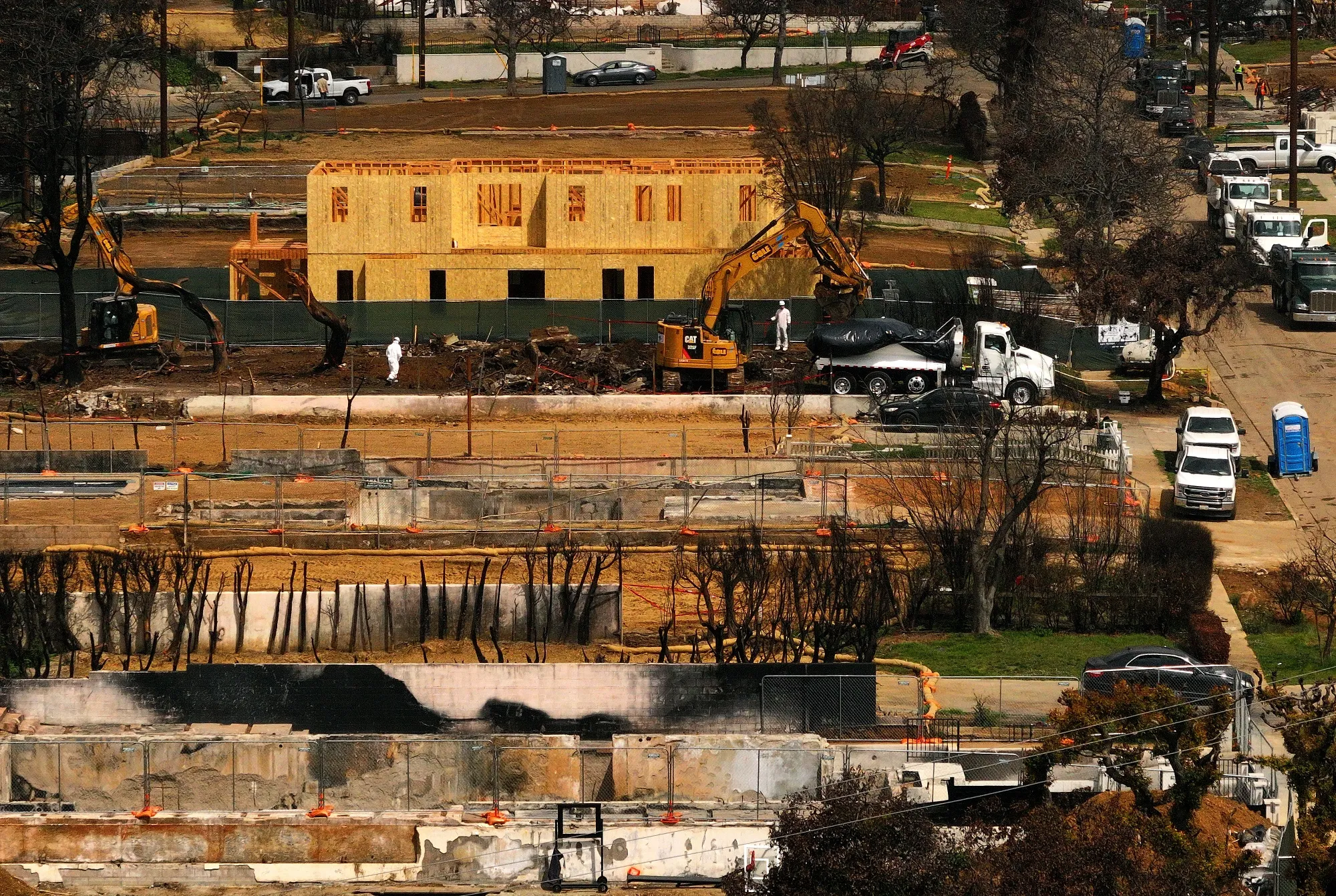 Construction has been slow in the neighborhood destroyed by the Palisades Fire. 
