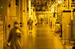 Employees&nbsp;walk through the GlobalFoundries semiconductor&nbsp;manufacturing&nbsp;facility in Malta, New York.