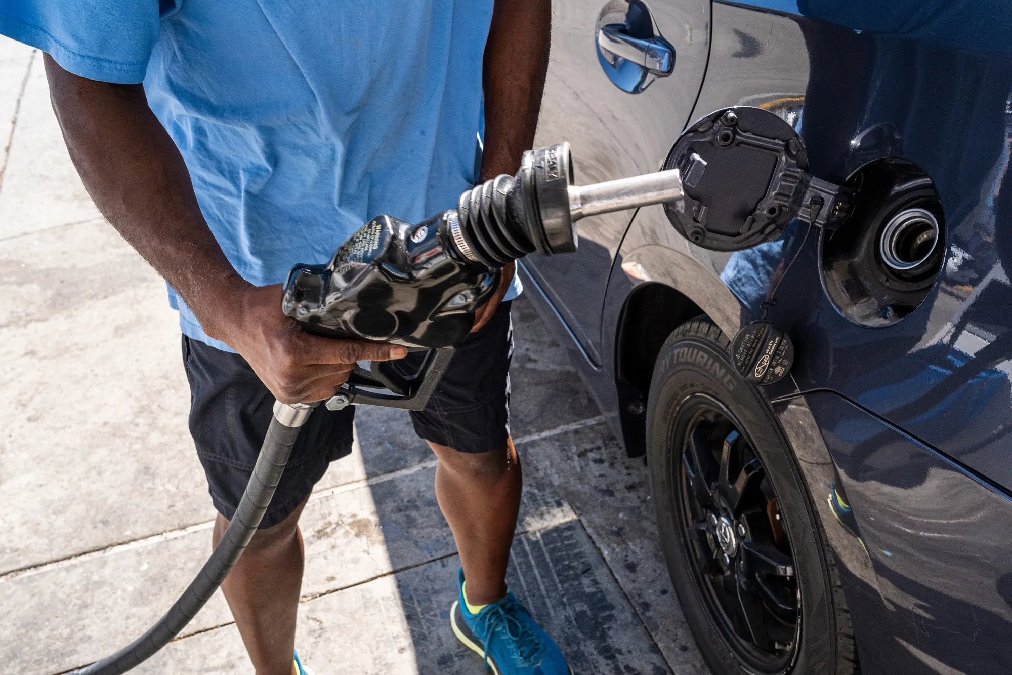 A customer refuels at a gas station in San Francisco, California.