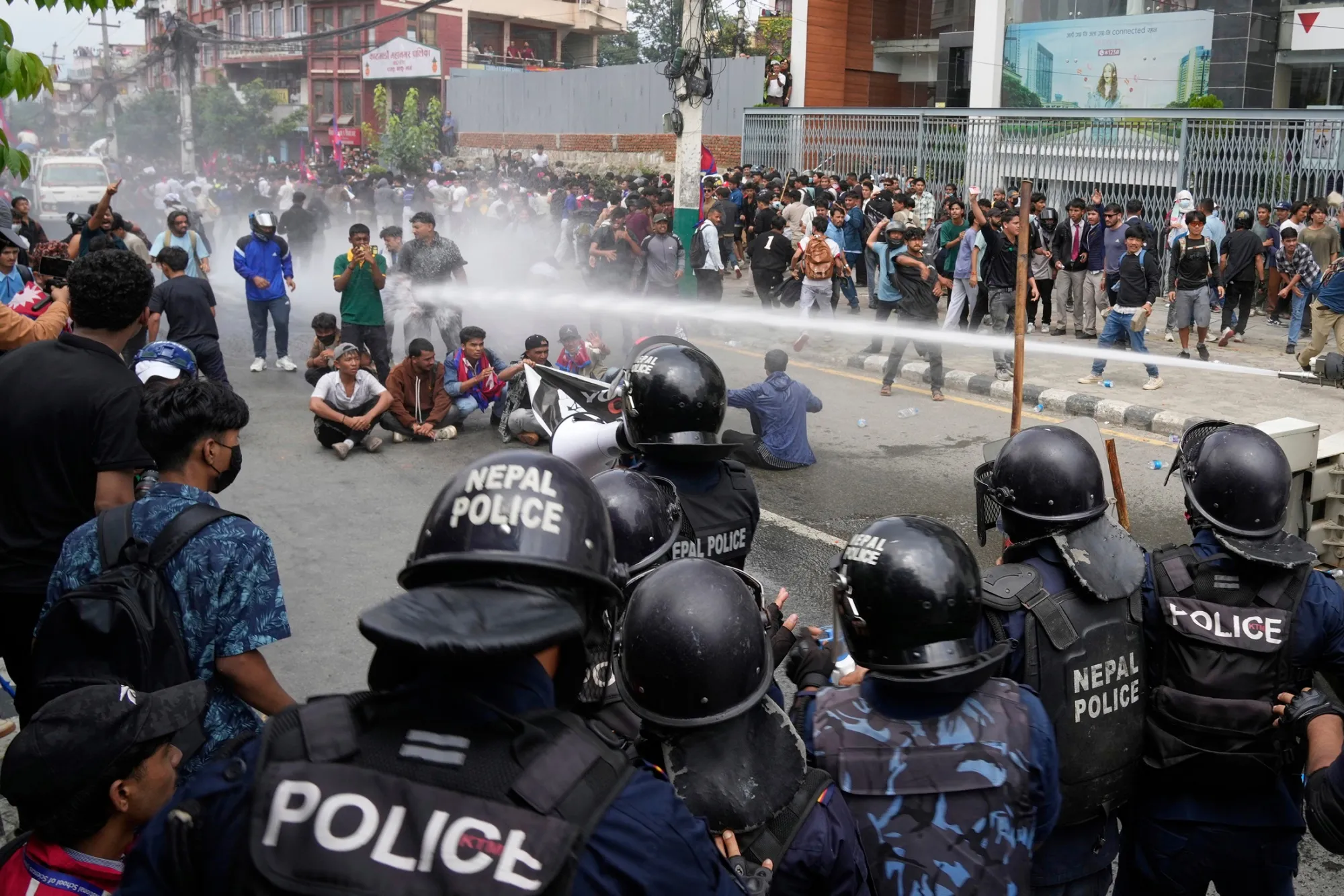 Riot police use water cannon against protesters during clashes outside parliament in Kathmandu, Nepal, on Sept. 8.