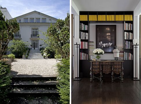 From left: The exterior of the building; a 17th century Mazarin desk sits under a custom bookshelf.