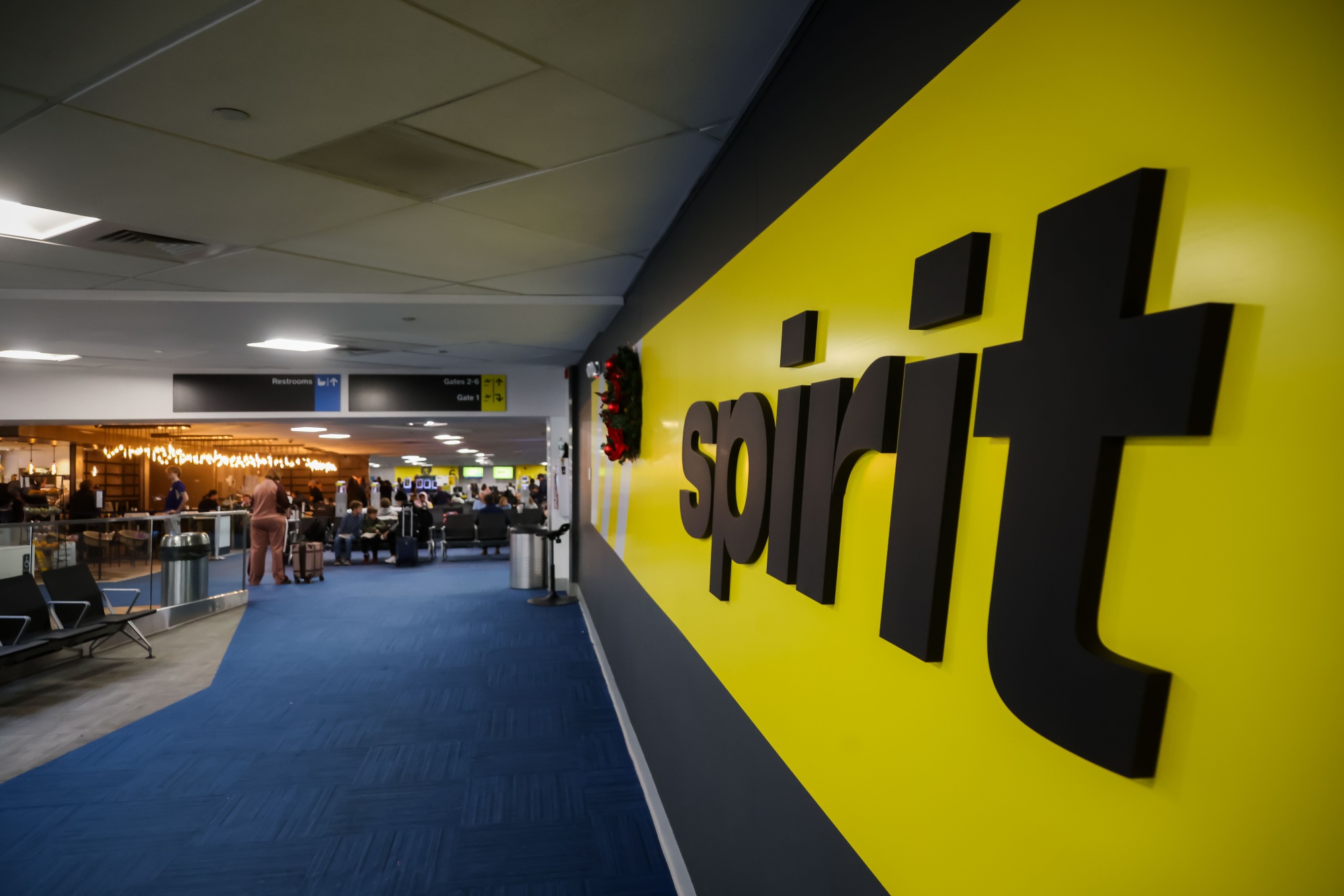 Spirit signage at Terminal A at LaGuardia Airport in the Queens borough of New York on Nov. 26.