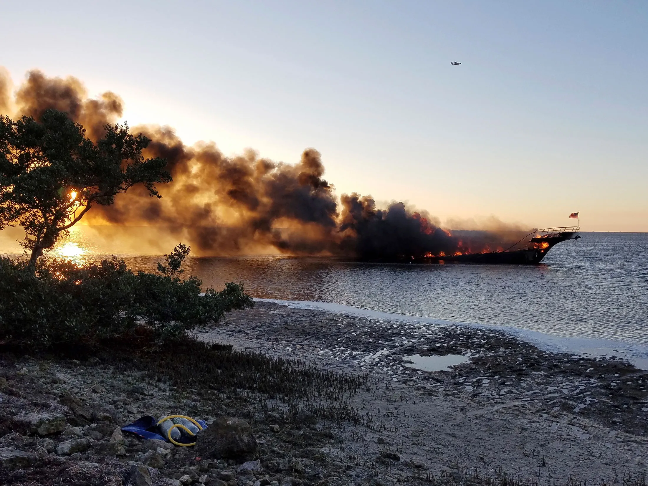 Fames engulf a boat in the Tampa Bay area on Jan. 14.