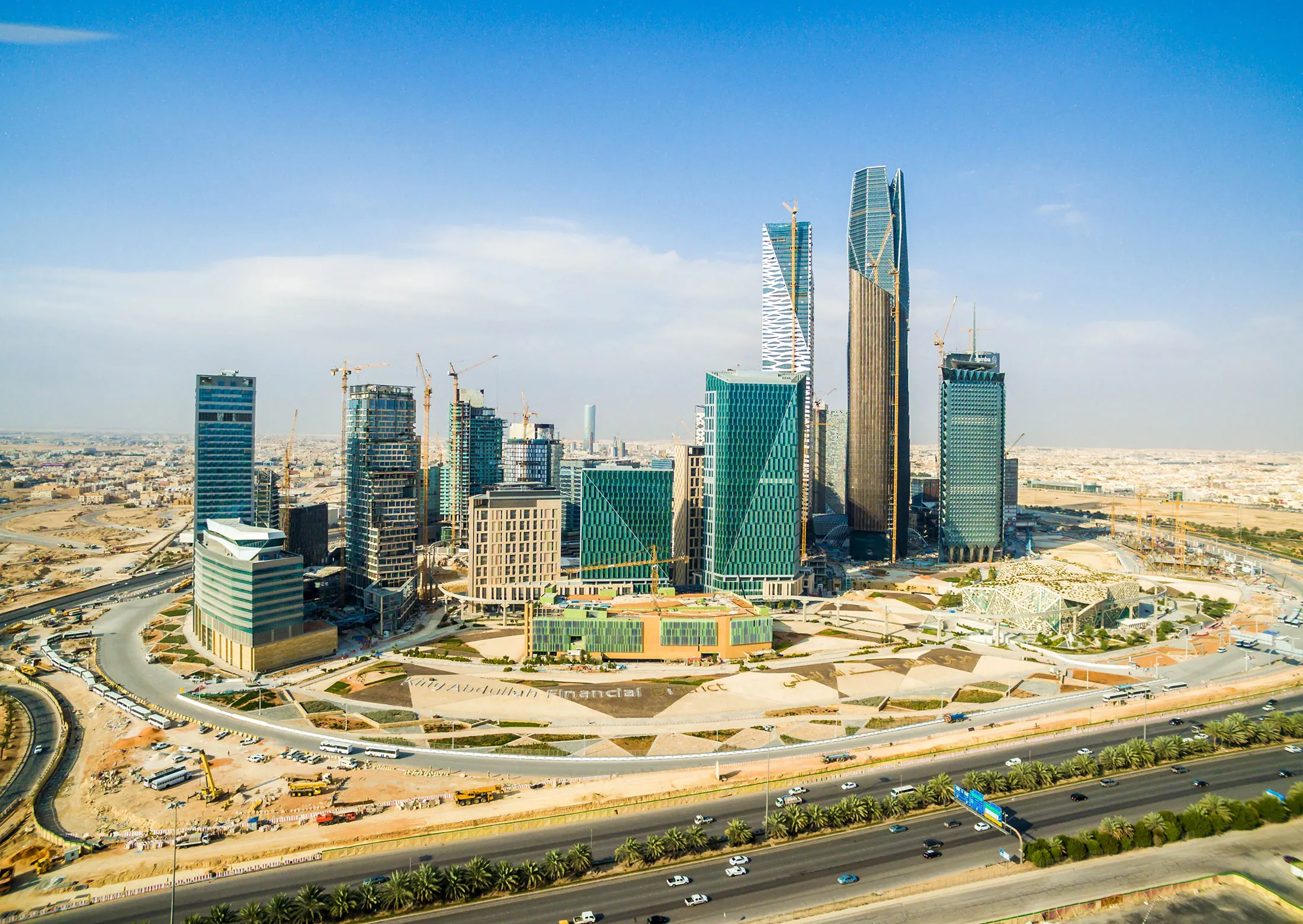 Skyscrapers stand in the King Abdullah financial district in Riyadh, Saudi Arabia, on Saturday, Jan. 9, 2016. Saudi Arabian stocks led Gulf Arab markets lower after oil extended its slump from the lowest close since 2004.
