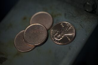 Retailers Seek Law Rounding to Nearest Nickel as Pennies Go Away