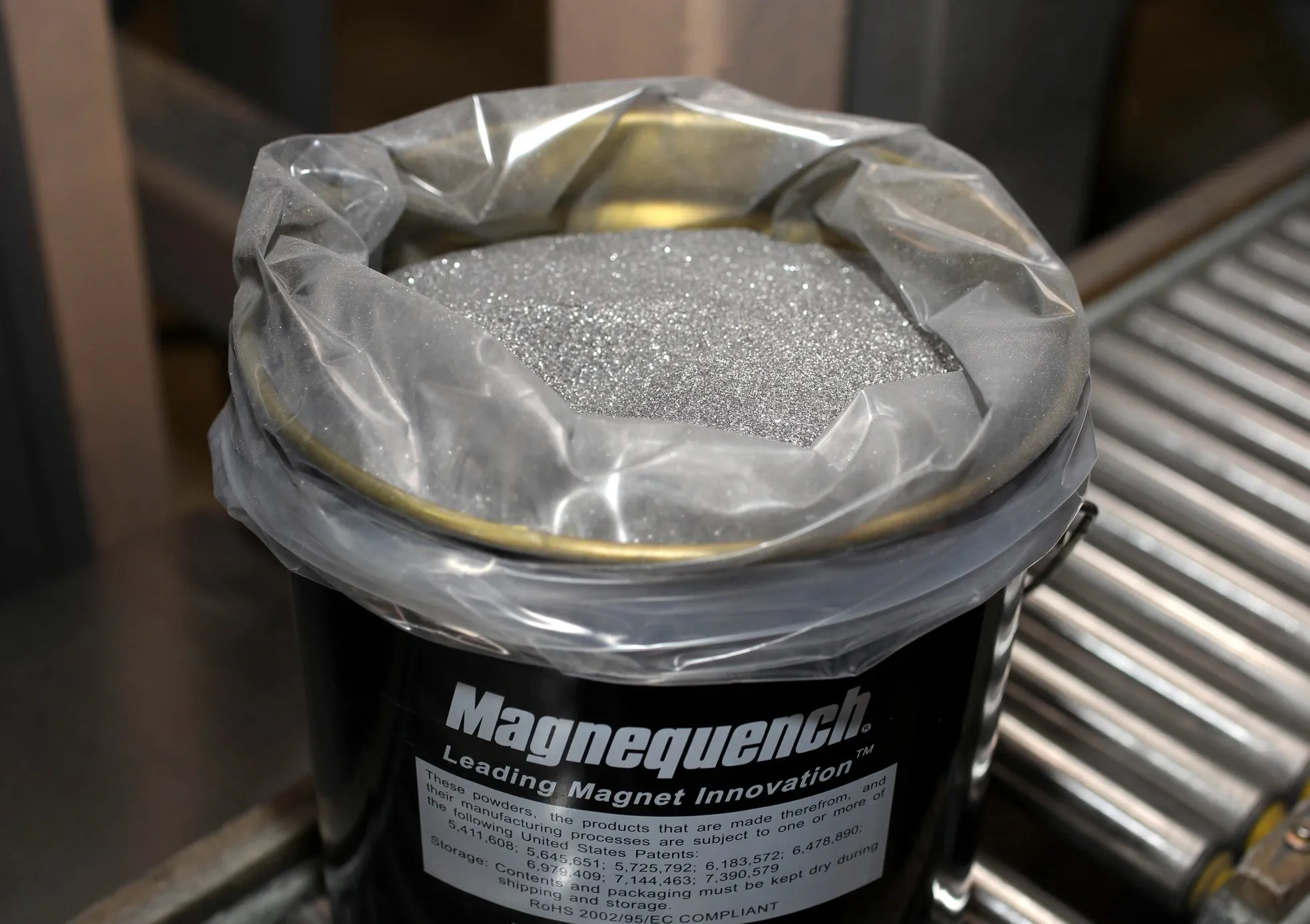 A container filled with neodymium-iron-boron powder, used in sensors, computers, and mobile phones at a factory in Tianjin, China.