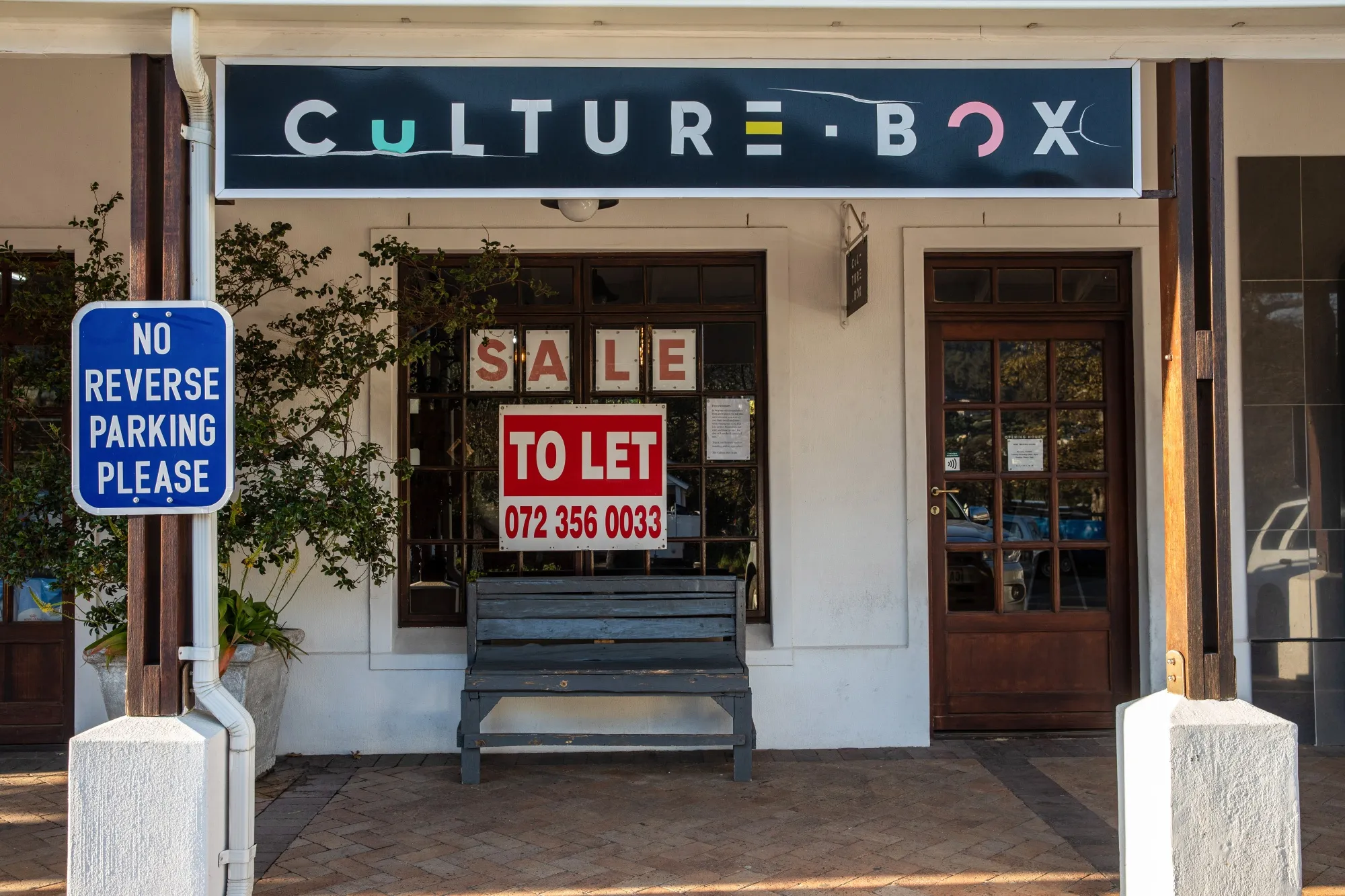 A 'to let' sits inside the retail unit of a recently closed store in Cape Town.