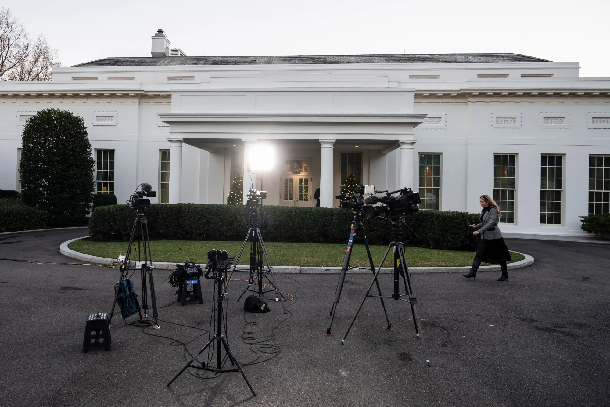 Television cameras outside the West Wing of the White House in Washington.