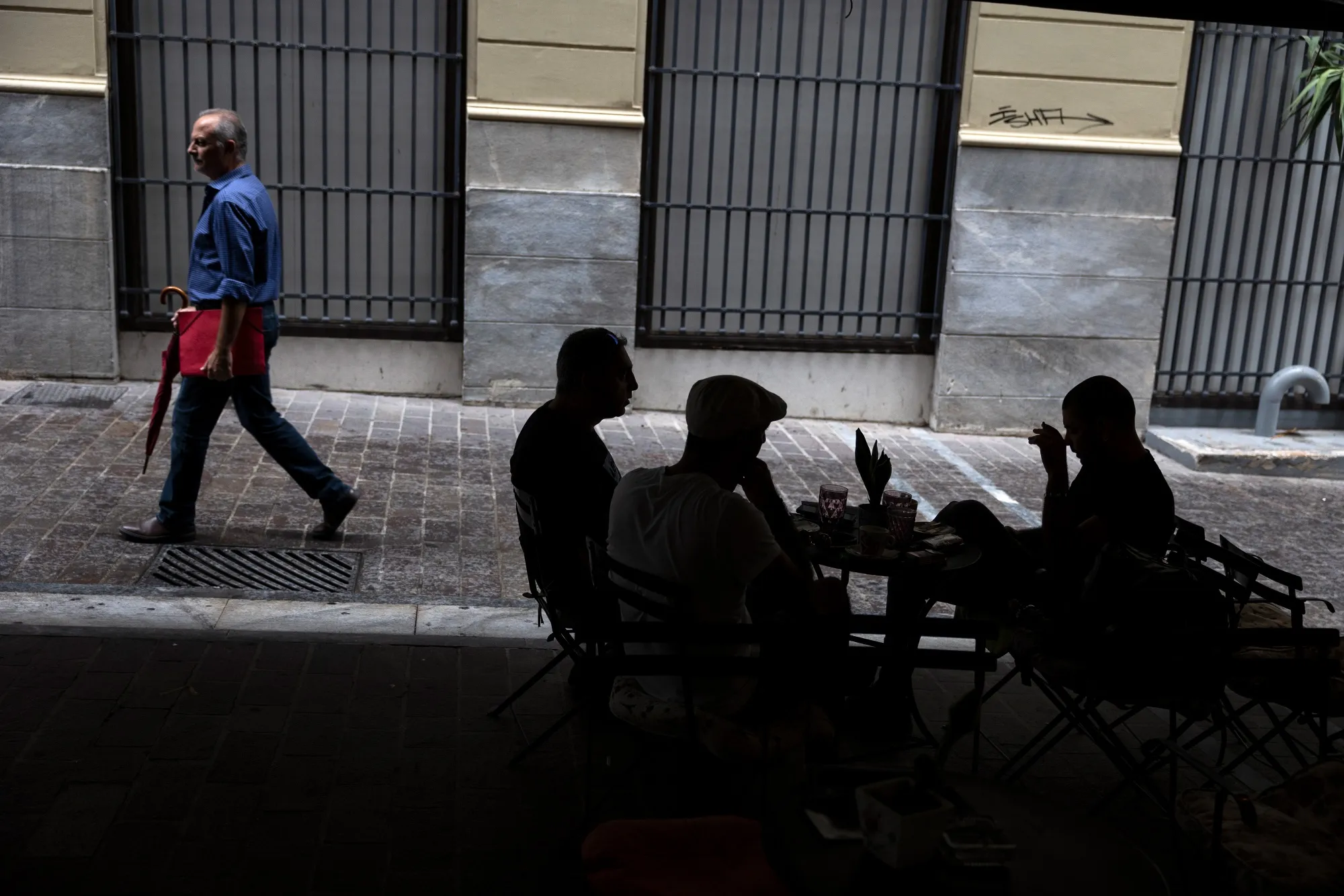 Customers at a cafe in Athens, Greece.