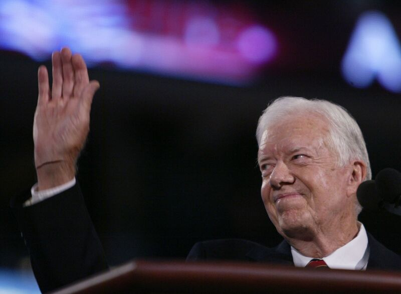 UNITED STATES - JULY 26: Former President Jimmy Carter waves to the crowd during the opening session of the Democratic National Convention in Boston, Massachusetts Monday July 26, 2004. 