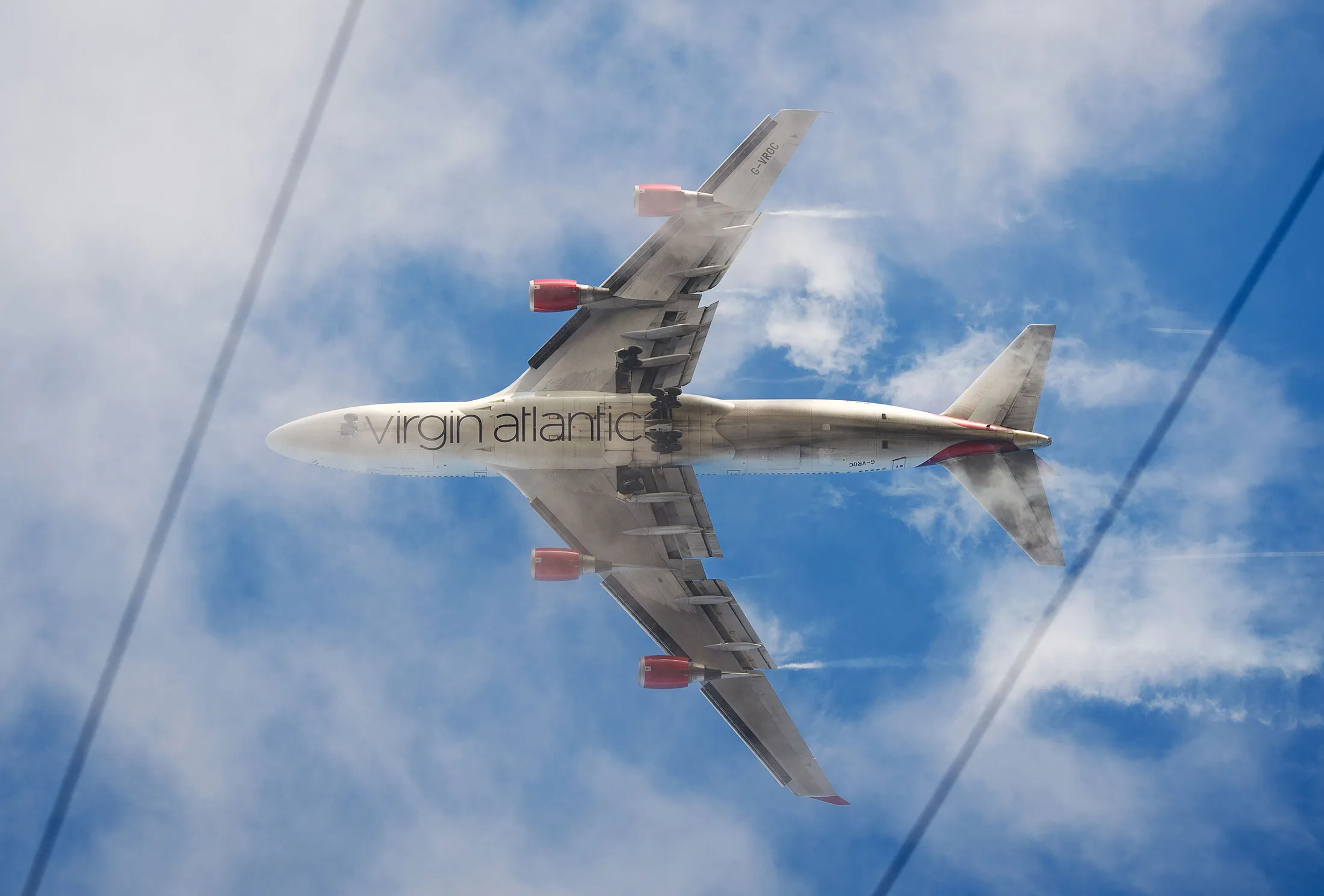 A Virgin Atlantic aircraft comes into land.
