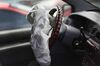 A deployed airbag is seen in a Chrysler vehicle at a salvage yard on May 22, 2015 in Medley, Florida.