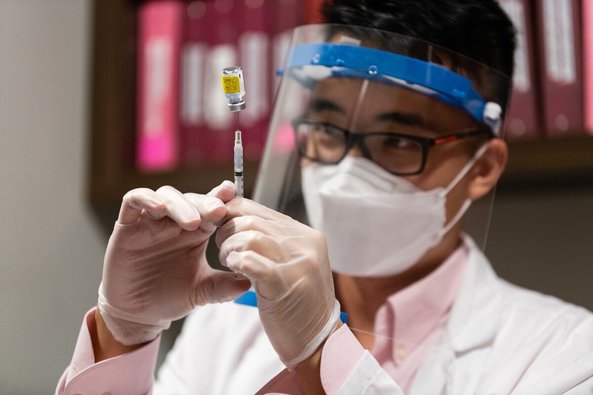 Hong Kong Experts Back Pfizer Shots, Clearing Way for Approval Bloomberg