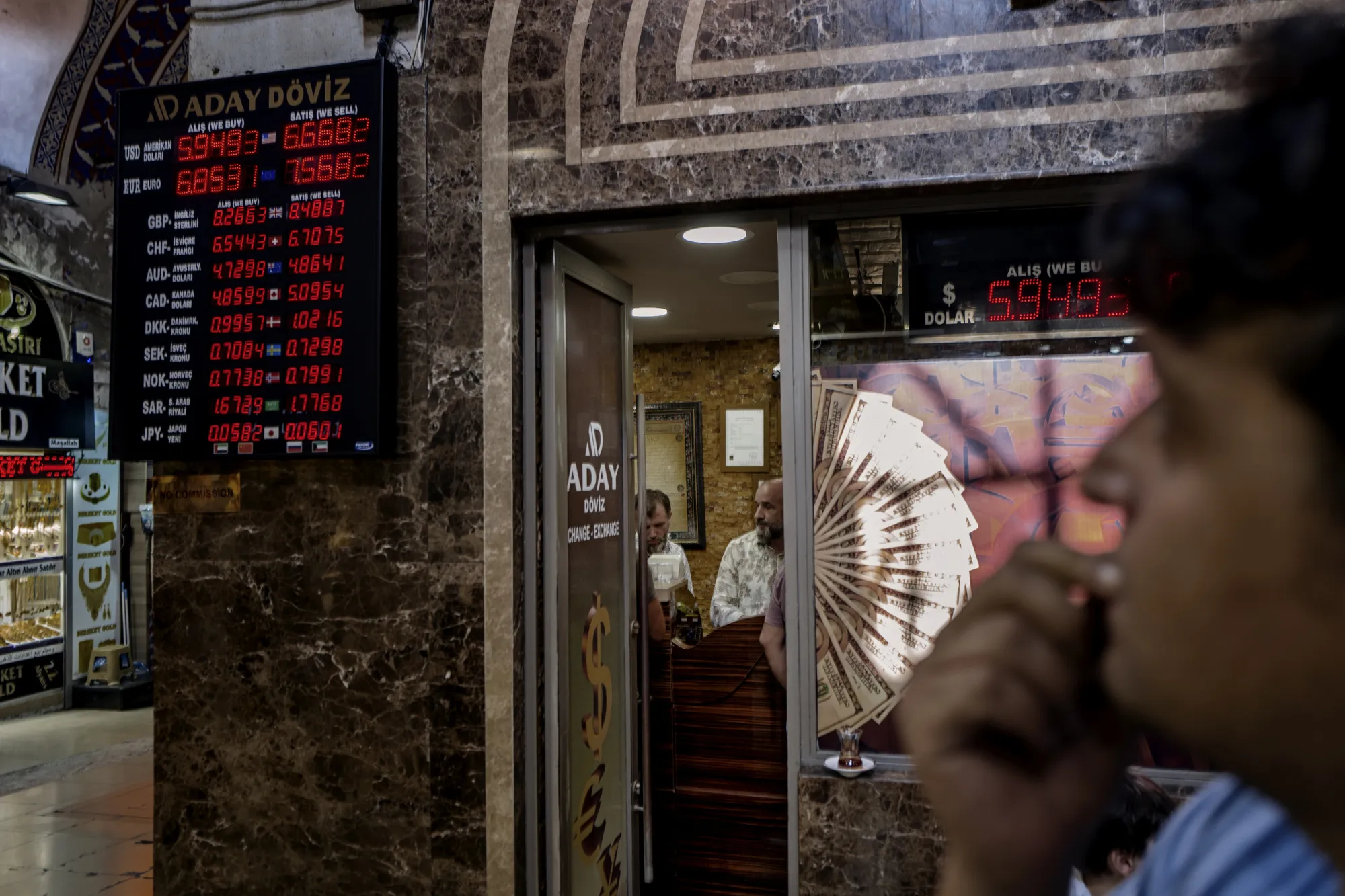International currency exchange rates stand on display outside a bureau in the Grand Bazaar in Istanbul.