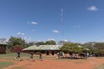 Students from Daraja Academy in&nbsp;Laikipia, Kenya, run across the schoolyard during a break. The Daraja cell tower can be seen behind the school’s administration block.