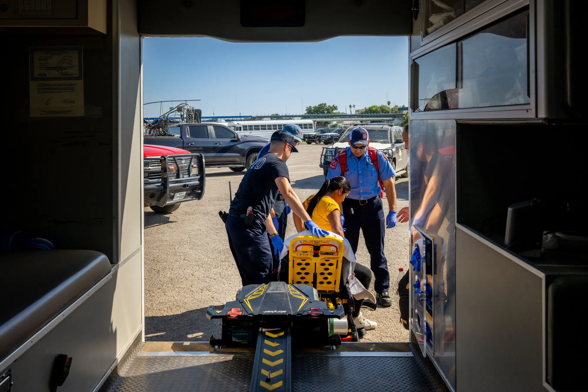Emergency medical technicians respond to a pregnant woman suffering from dehydration in Eagle Pass, Texas.&nbsp;