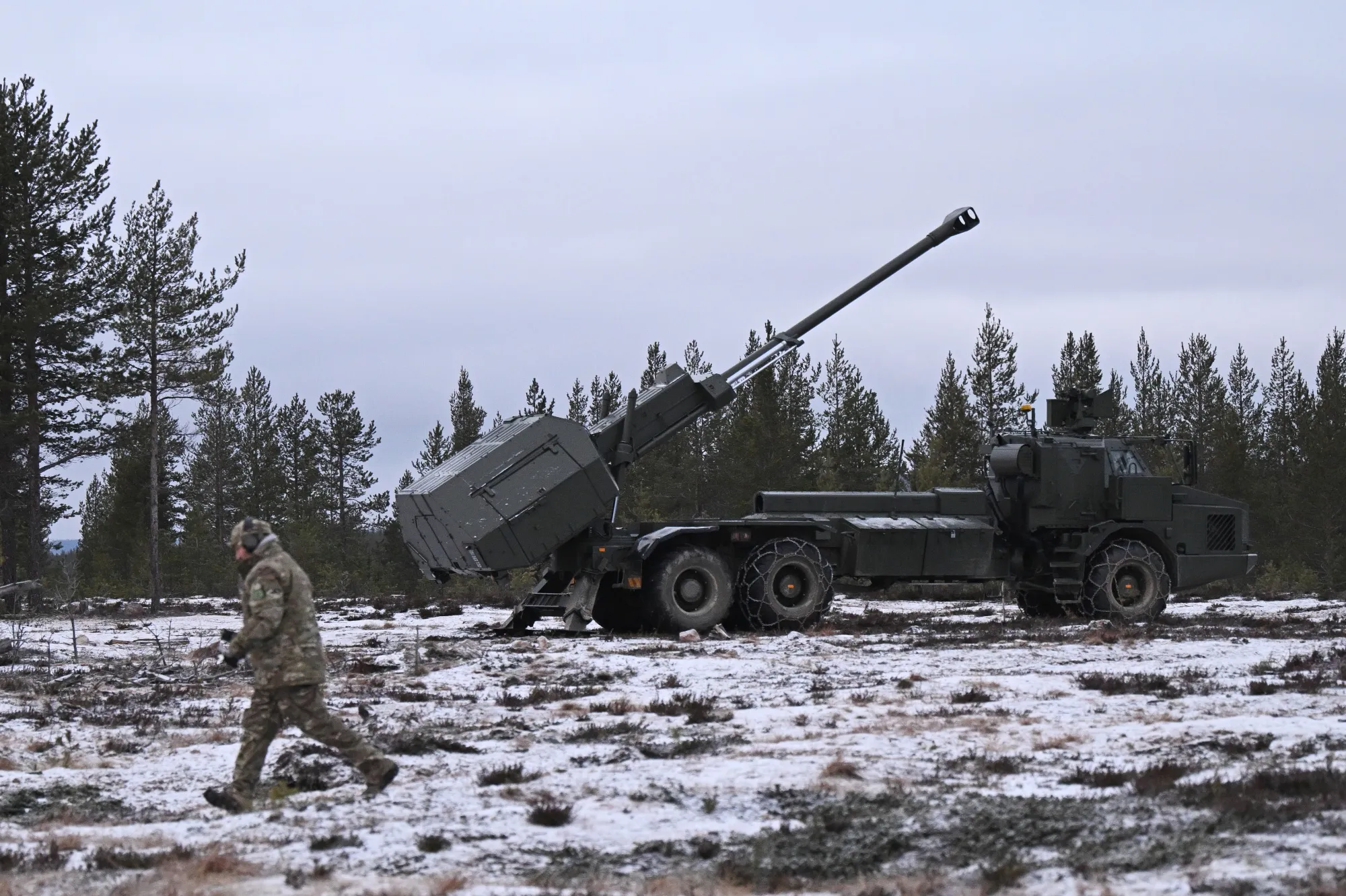 Members of a UK&nbsp;Artillery unit prepare to fire shells from an Archer mobile Howitzer during live fire testing&nbsp;in Rovaniemi, Finland, on Nov. 18.
