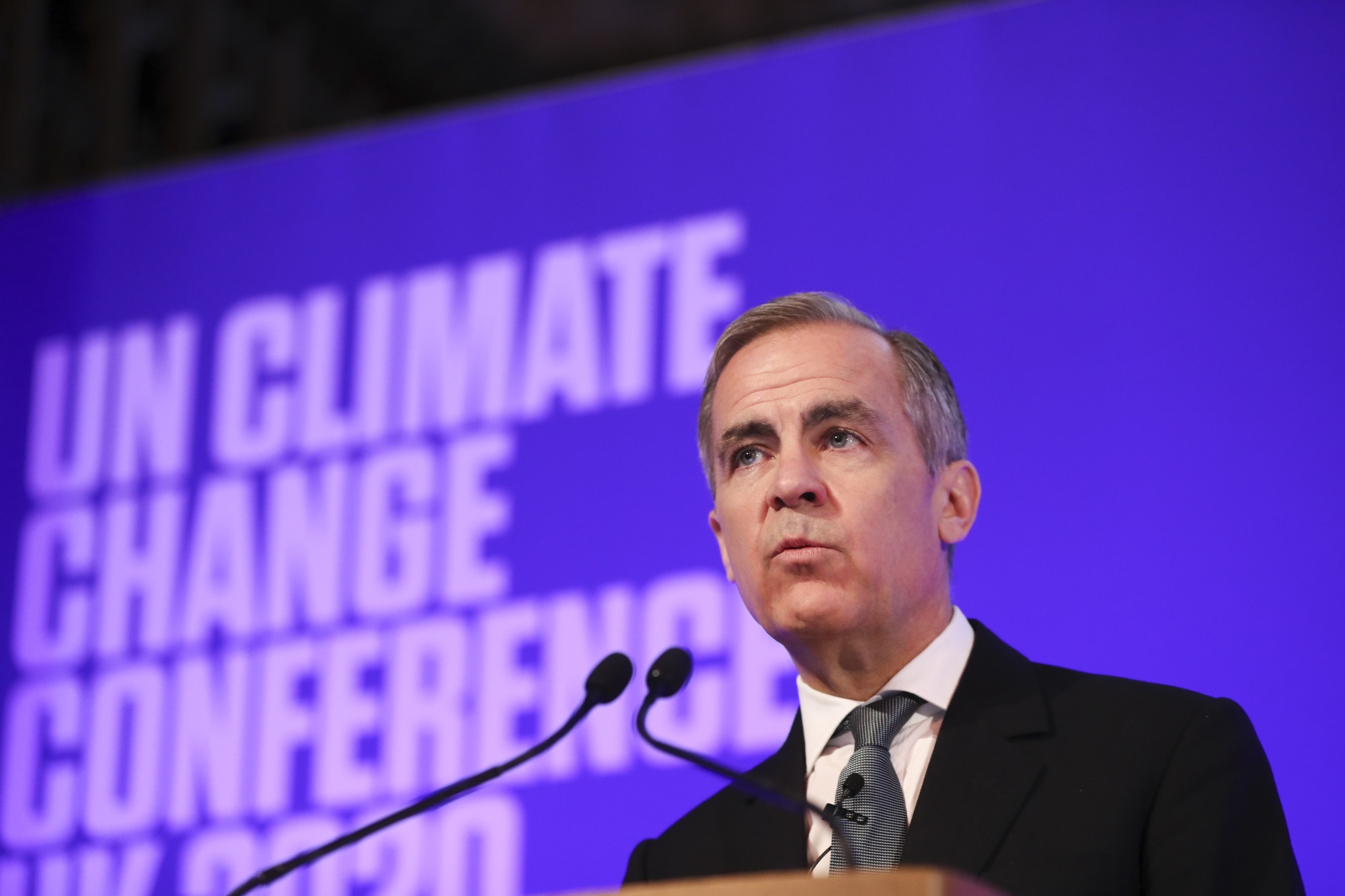 Mark Carney speaks at a United Nations even in London on Feb. 27, 2020.