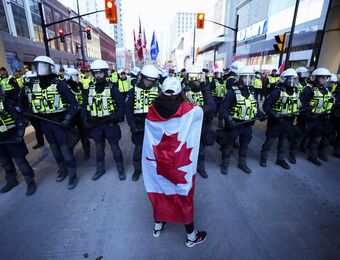 relates to Canadian Police Face Off With Protesters Opposed to Mandates