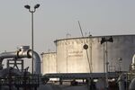 Crude oil storage tanks stand at Saudi Aramco's Abqaiq crude oil plant in Saudi Arabia.