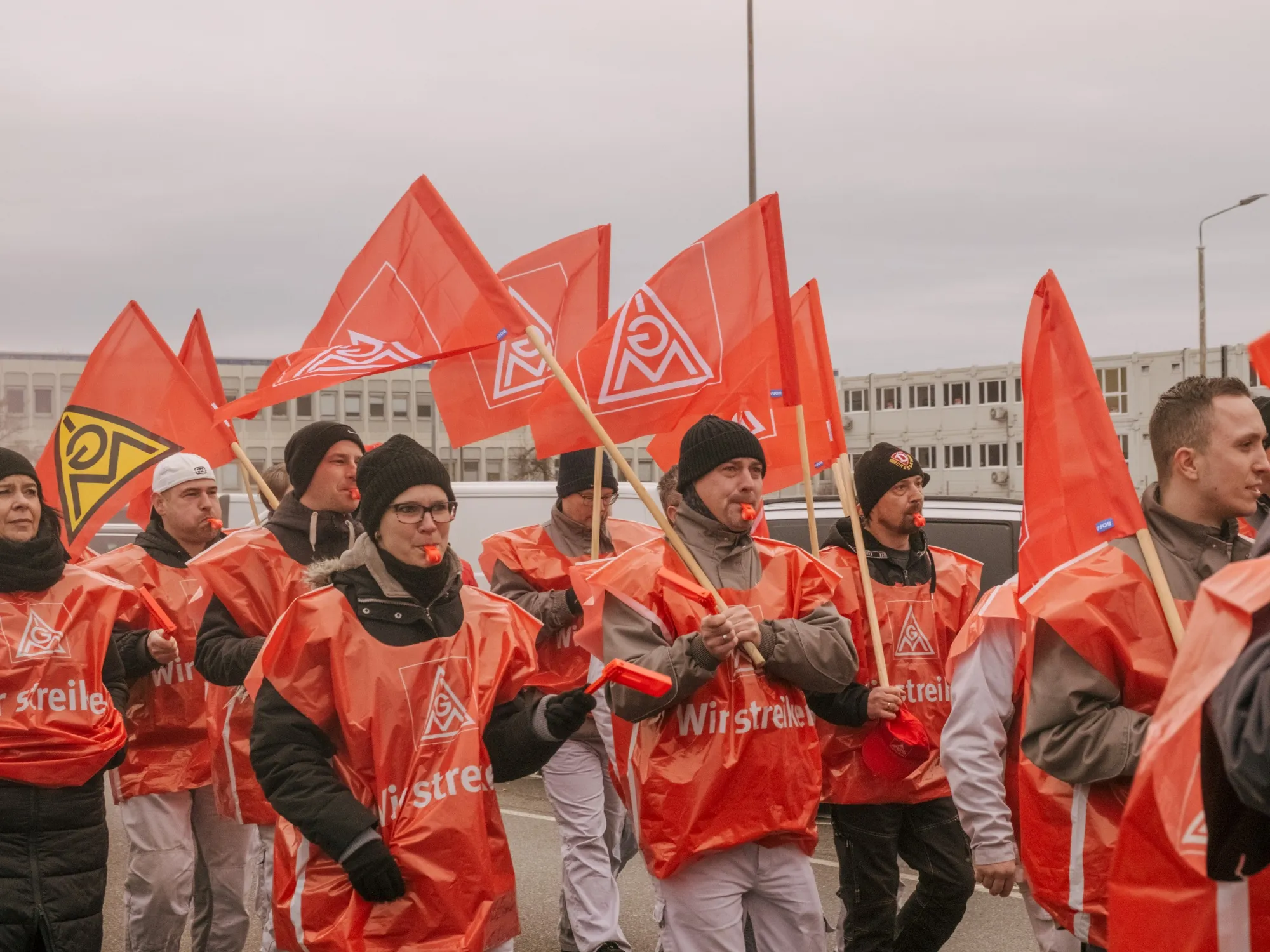 Workers stage a temporary walkout warning strike at the Volkswagen AG factory in Zwickau, Germany, on Dec. 2.