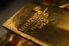 A Umicore SA hallmark sits on a gold bar in the precious metals vault at Pro Aurum KG in Munich, Germany, on Wednesday, July 22, 2020. Silver jumped to the highest in almost seven years and gold continued its march toward a record on expectations there’ll be more stimulus to help the global economy recover from the coronavirus pandemic.
