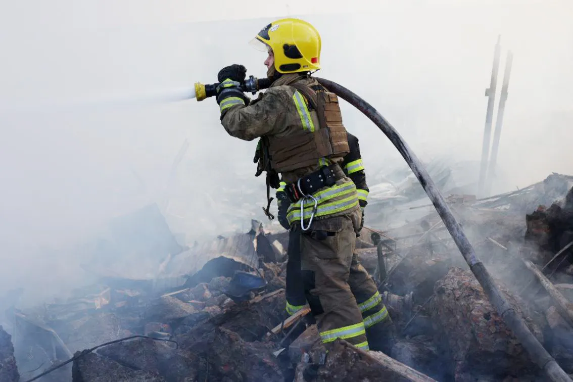 A firefighter tackles a blaze in&nbsp;Dnipro region.
