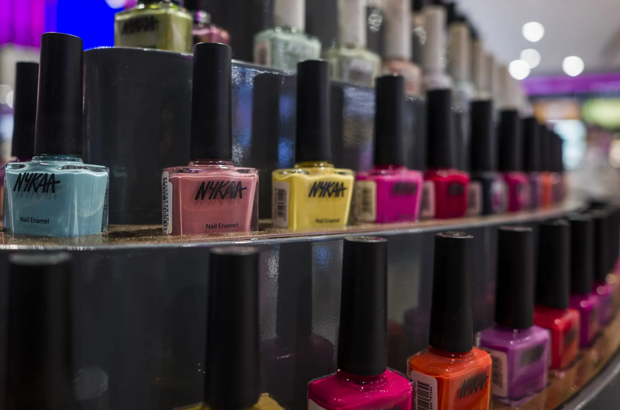 Bottles of Nykaa branded nail enamel.