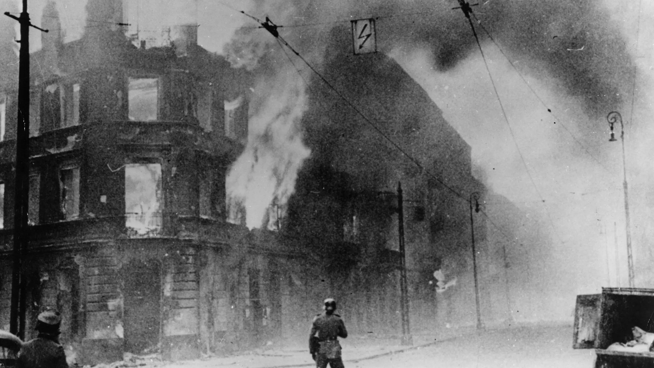 Fire breaks out during the Warsaw ghetto uprising, a Polish insurrection against the German forces who had occupied Poland at the start of World War II.
