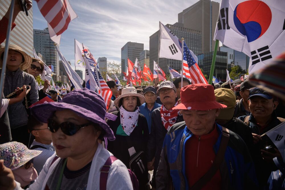 Anti-government activists rally in Seoul on Oct. 9.