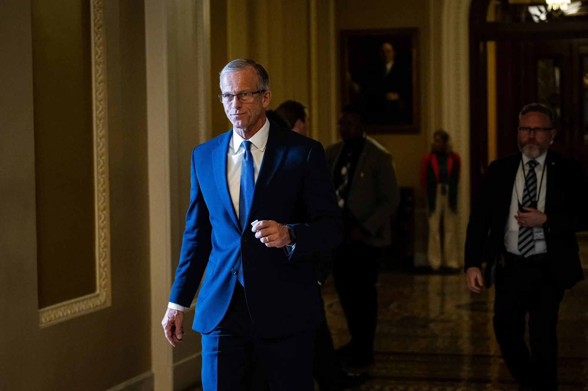 Senate Majority Leader John Thune walks towards his office at the US Capitol on March 17