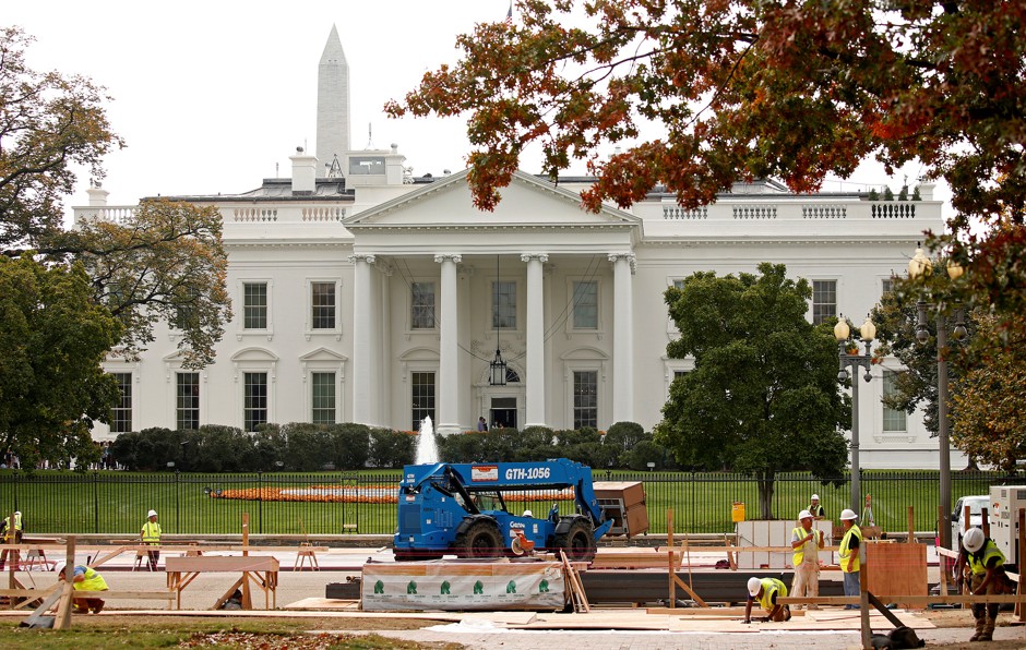 Work begins on Inaugural stands in front of the White House Nov. 3 in Washington.