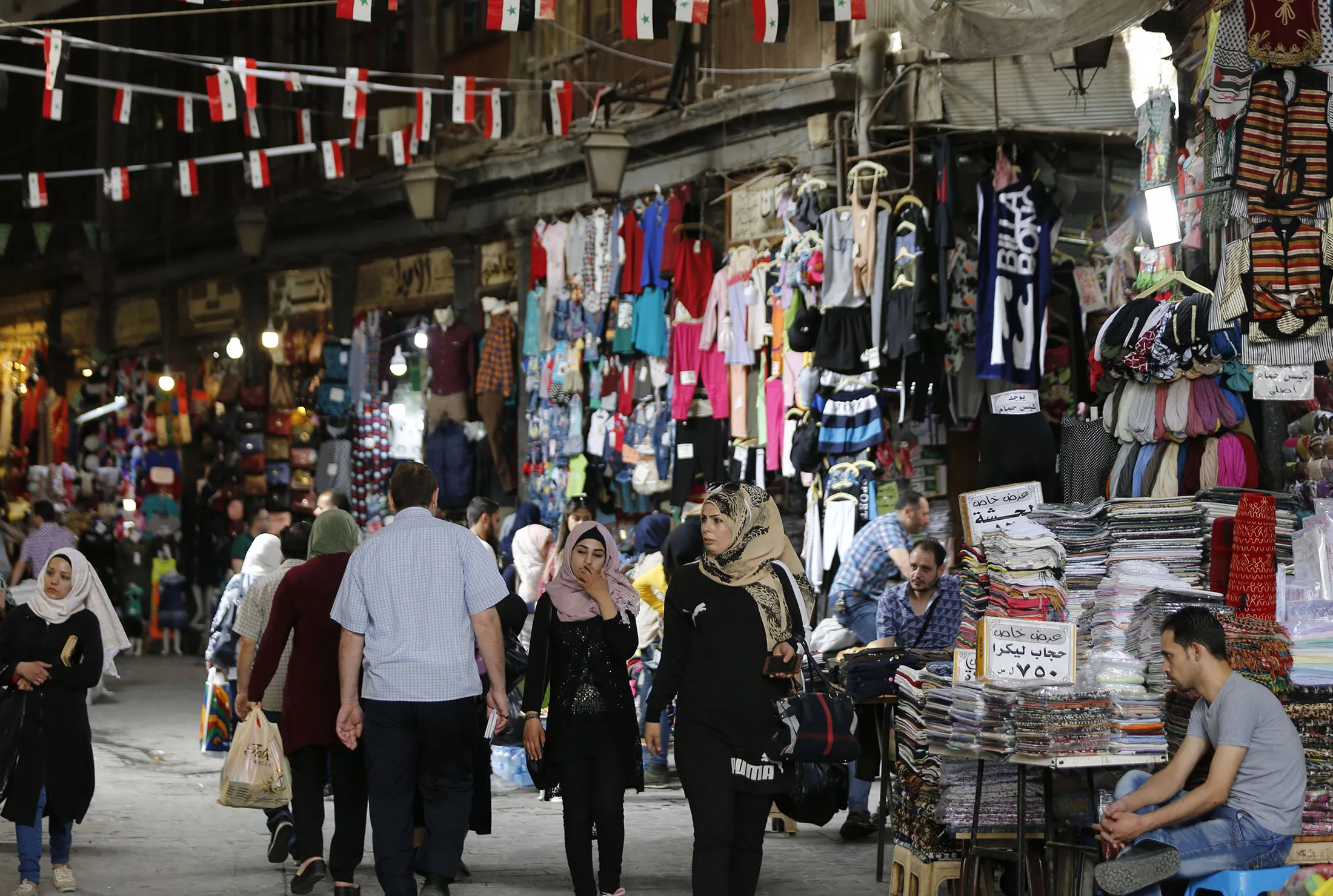People walk through Hamidiyyeh in Old Damascus May 22, 2018.