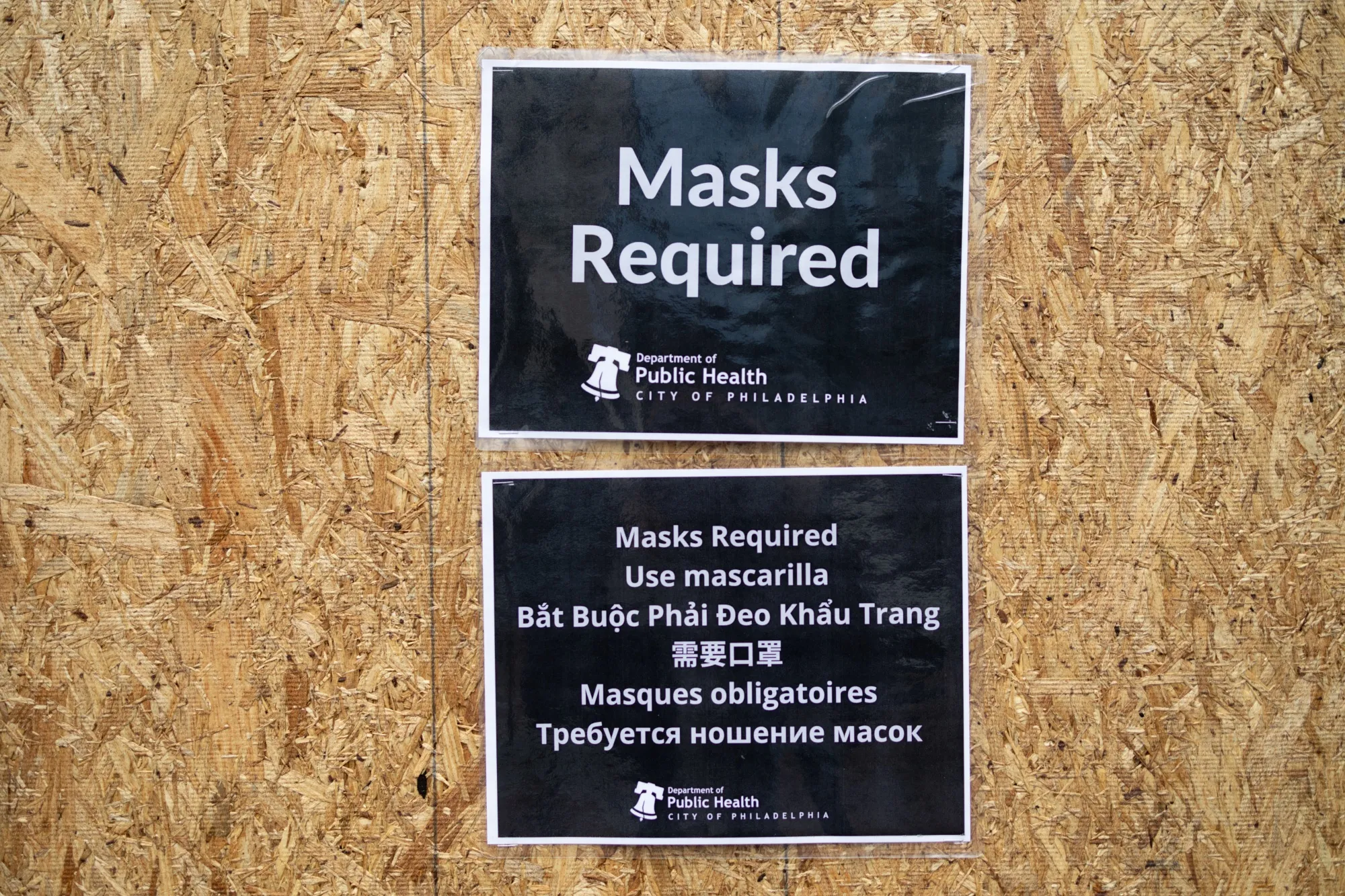 A "Masks Required' sign outside of a restaurant as the indoor mask mandate is reinstated in Philadelphia, Pennsylvania on April 18.