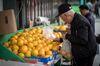 An man shops for produce in San Francisco, Calif. on June 19, 2018.