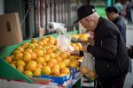 An man shops for produce in San Francisco, Calif. on June 19, 2018.