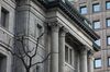 The Bank of Japan (BOJ) headquarters stand in Tokyo, Japan, on Friday, Jan. 4, 2019. Japan's benchmark bond yield fell to the lowest in more than two years on Friday as a stronger yen and a slowdown in global manufacturing spurred demand for the assets as a haven.
