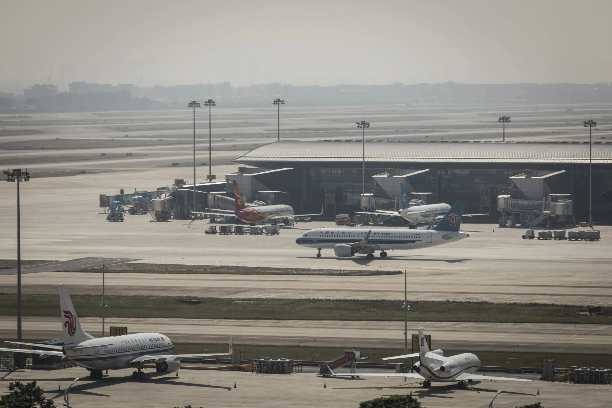 A China Southern Airlines Co. aircraft taxis on the tarmac at the Guangzhou Baiyun International Airport in Guangzhou, China, on Thursday, Nov. 2, 2017.