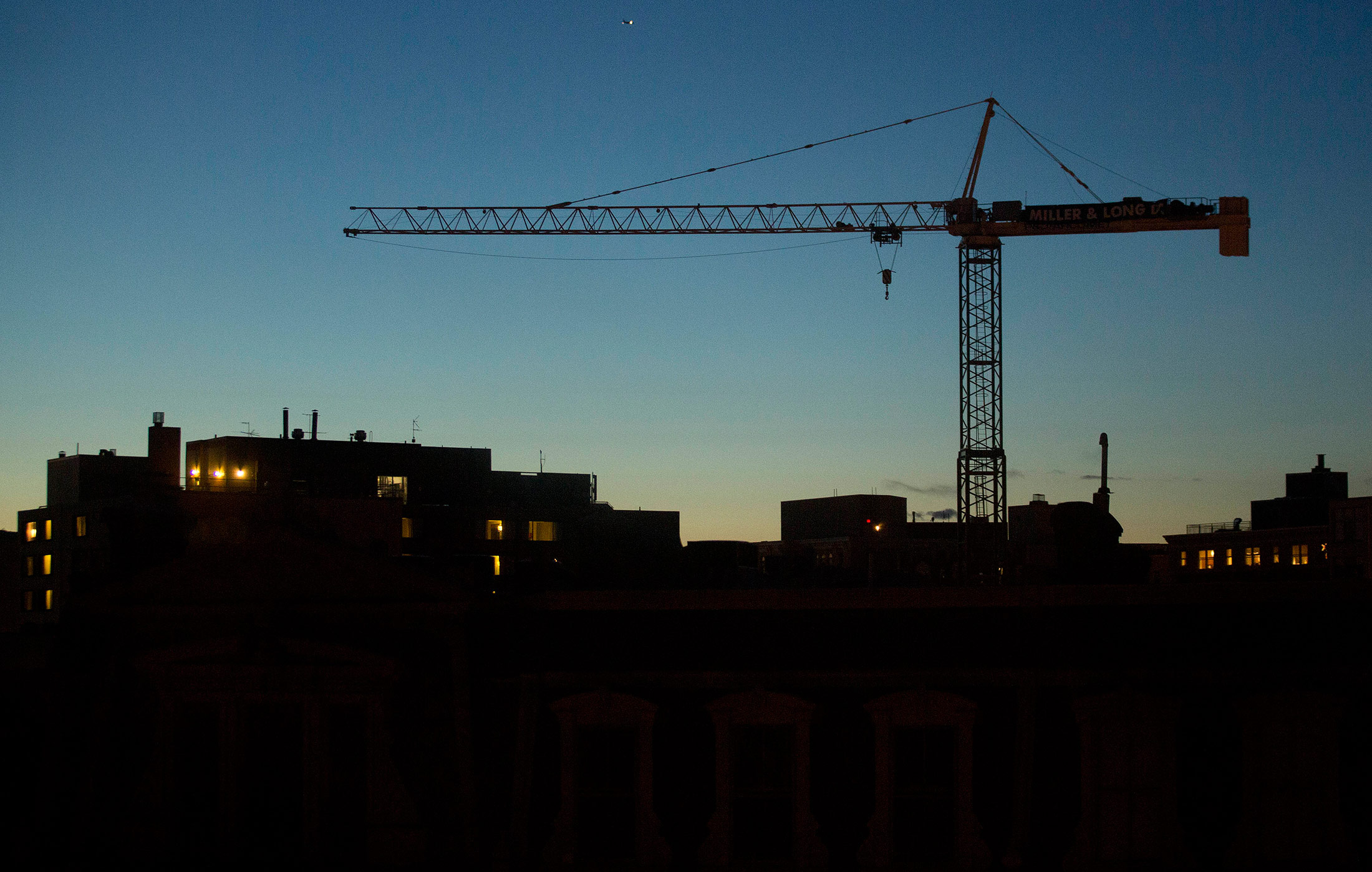 A crane stands over a construction site in Washington, D.C.
