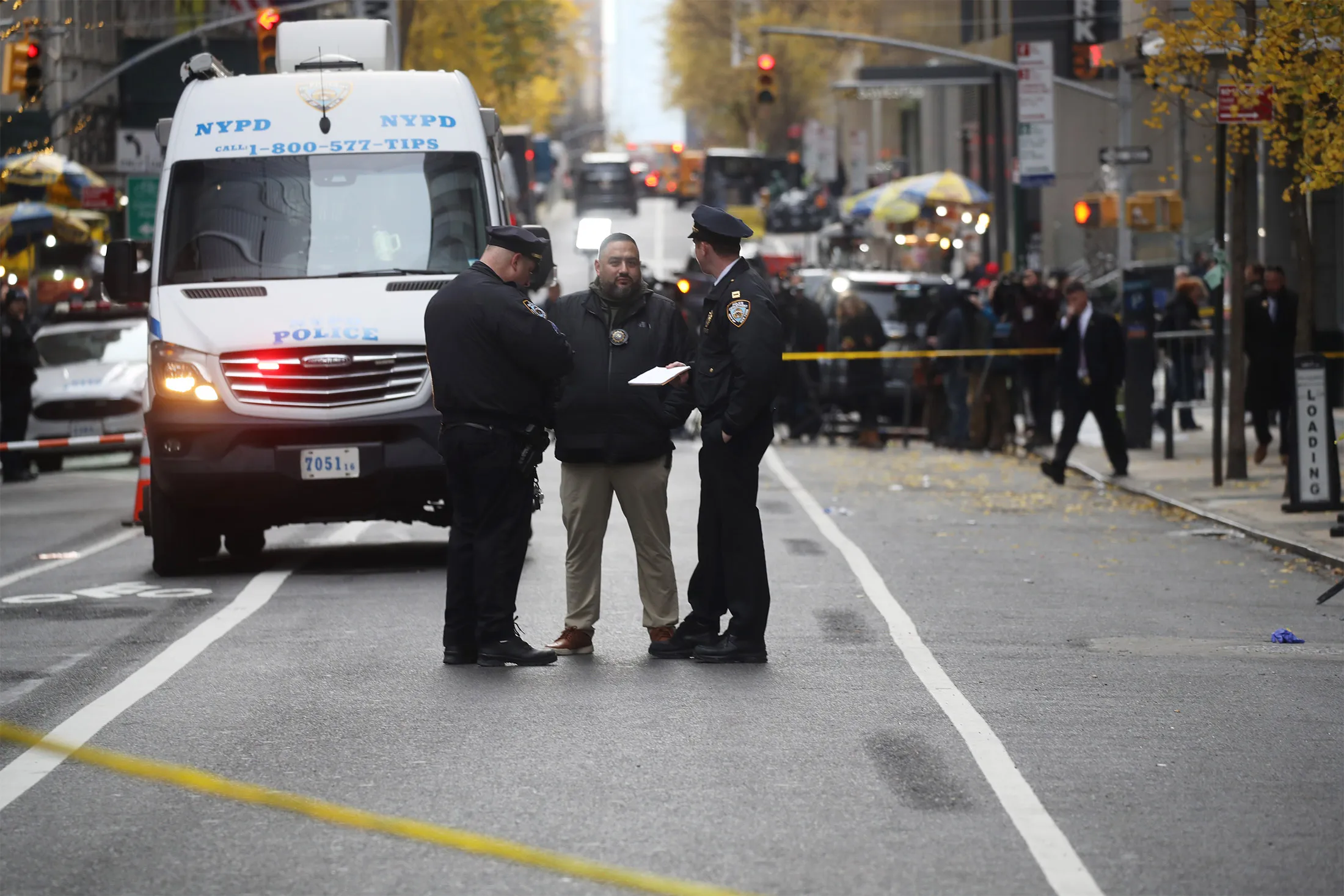 Police at the scene of the shooting of UnitedHealth CEO Brian Thompson in New York on Dec. 4.
