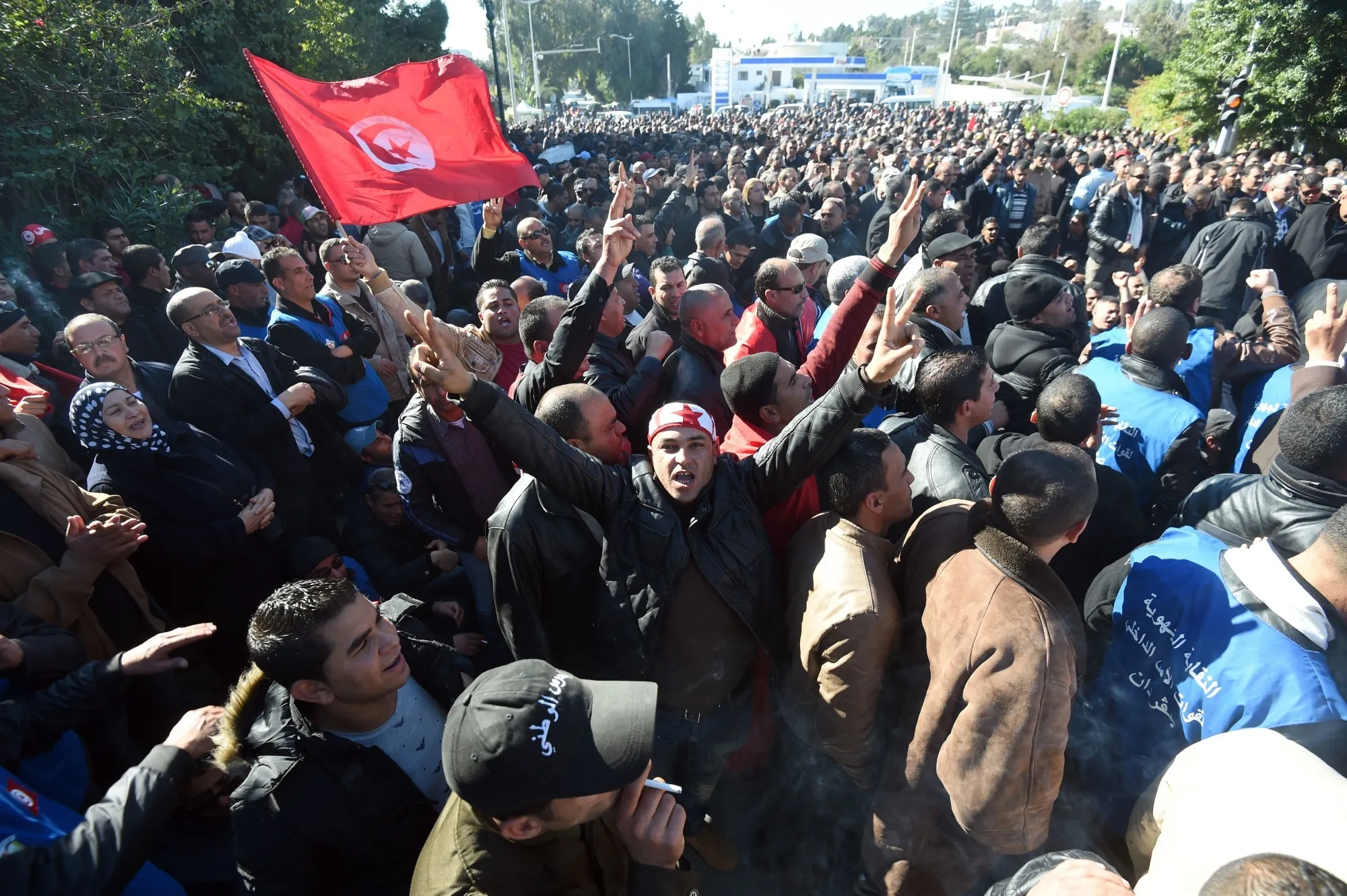 Tunisians demonstrate outside Tunis' Carthage Palace on Monday.
