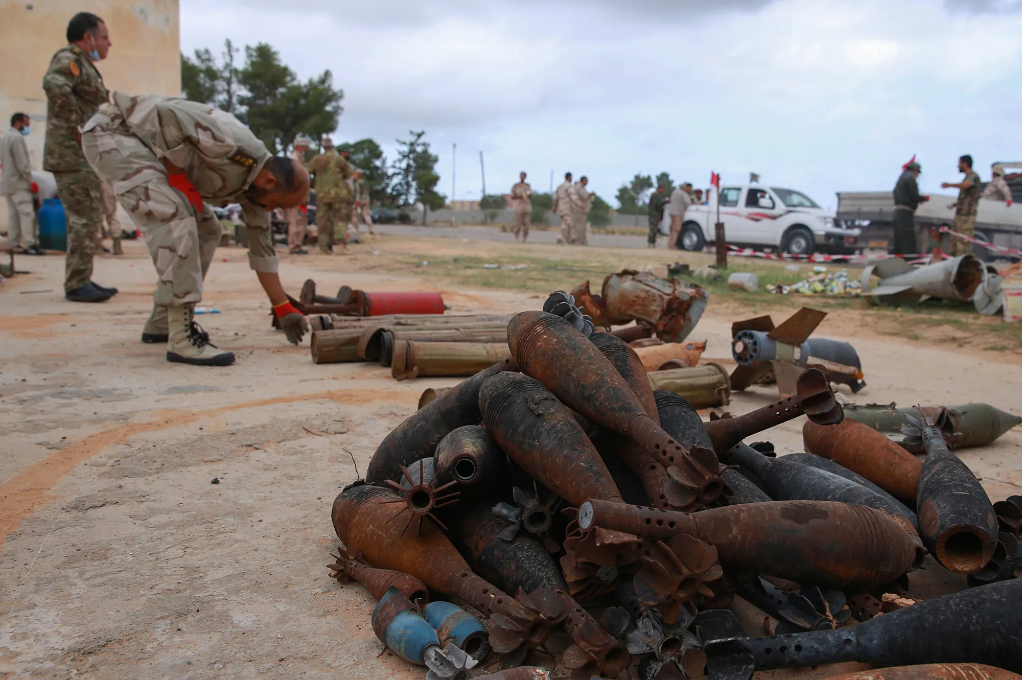 Government of National Accord soldiers sort ammunition for disposal in Tripoli, Libya, on Oct. 12.
