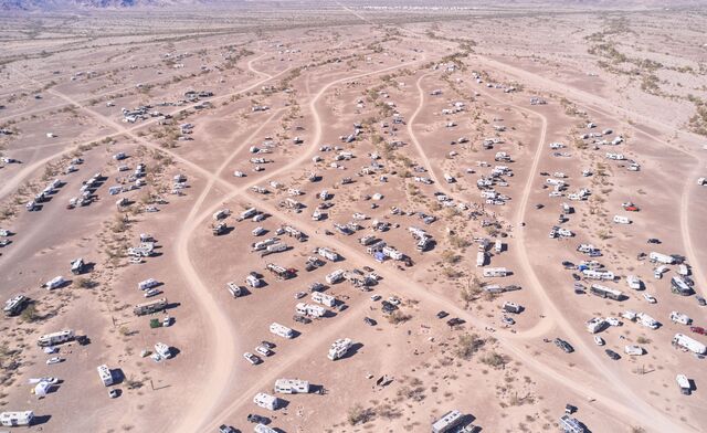 Aerial view of motor homes in Arizona desert.