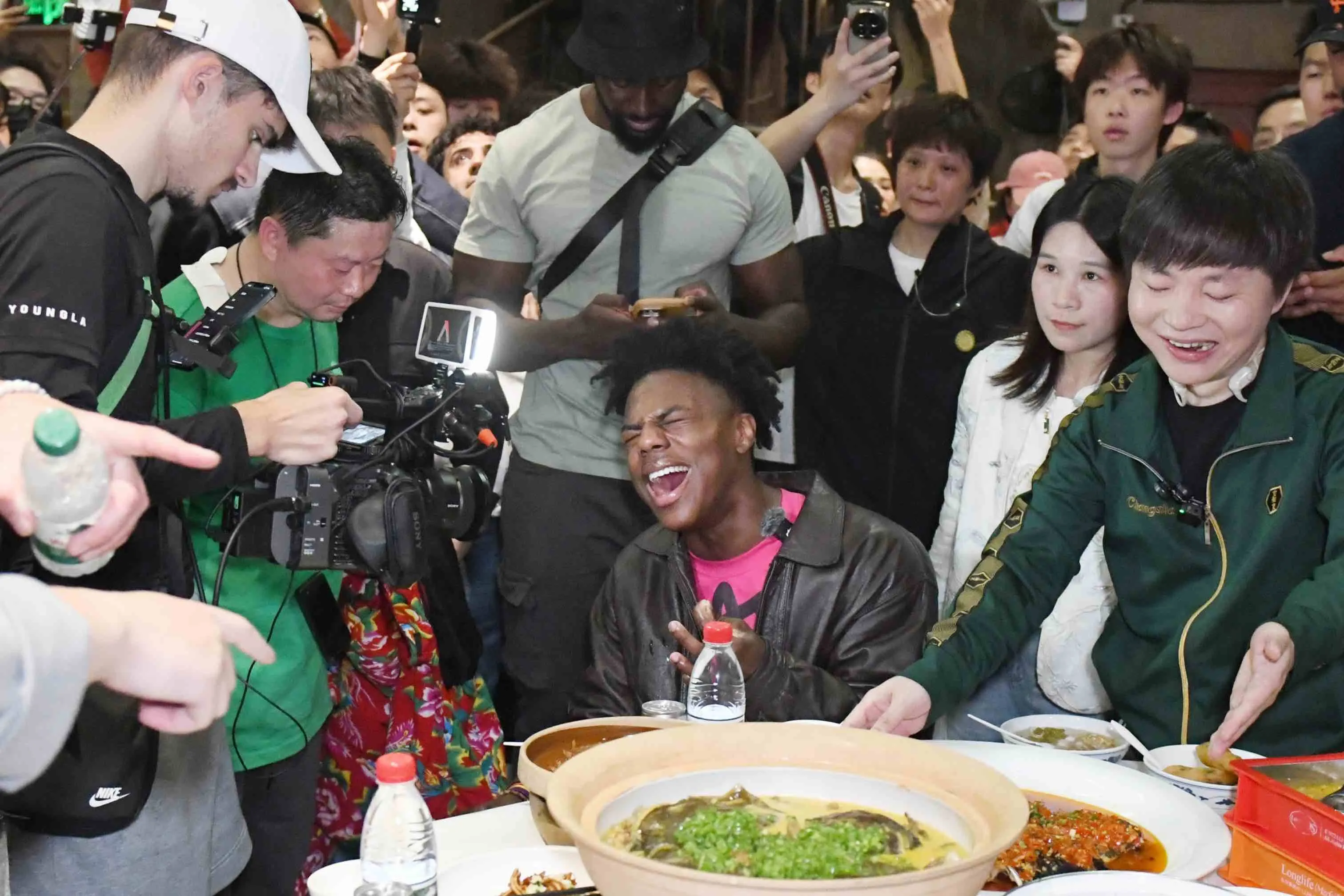 American streamer IShowSpeed, center, during a stop in Changsha, China on April 7.