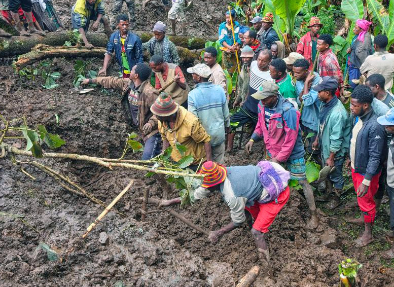 Locals search for the bodies of mudslide victims in the Gacho Baba district of the Gamo Zone in southern Ethiopia on Tuesday, March 10, 2026. (Gacho Baba District Government Communication Affairs Department via AP)