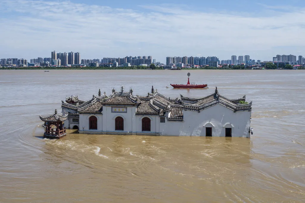 A partially submerged Guanyin temple in floodwaters in the swollen Yangtze River, in Ezhou.