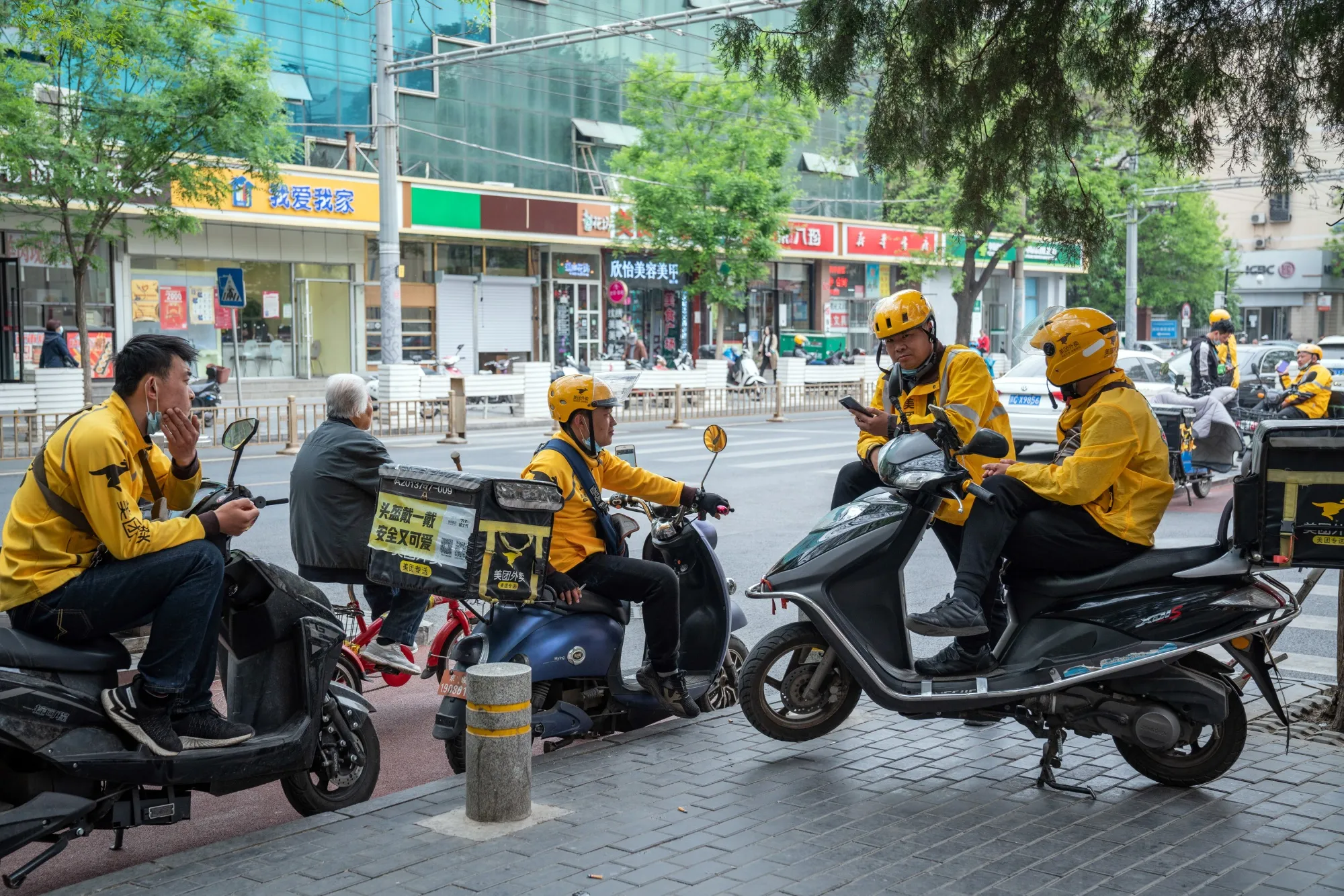 Meituan Couriers As Delivery Giant Raises $10 Billion to Fight Alibaba in Grocery Arena