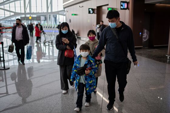 China Bans Travel From City at Center of Virus Outbreak as Death Toll Rises