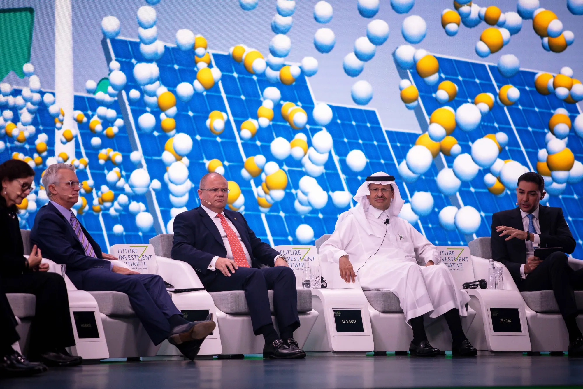Abdulaziz bin Salman, second right, at FII on Oct. 27.