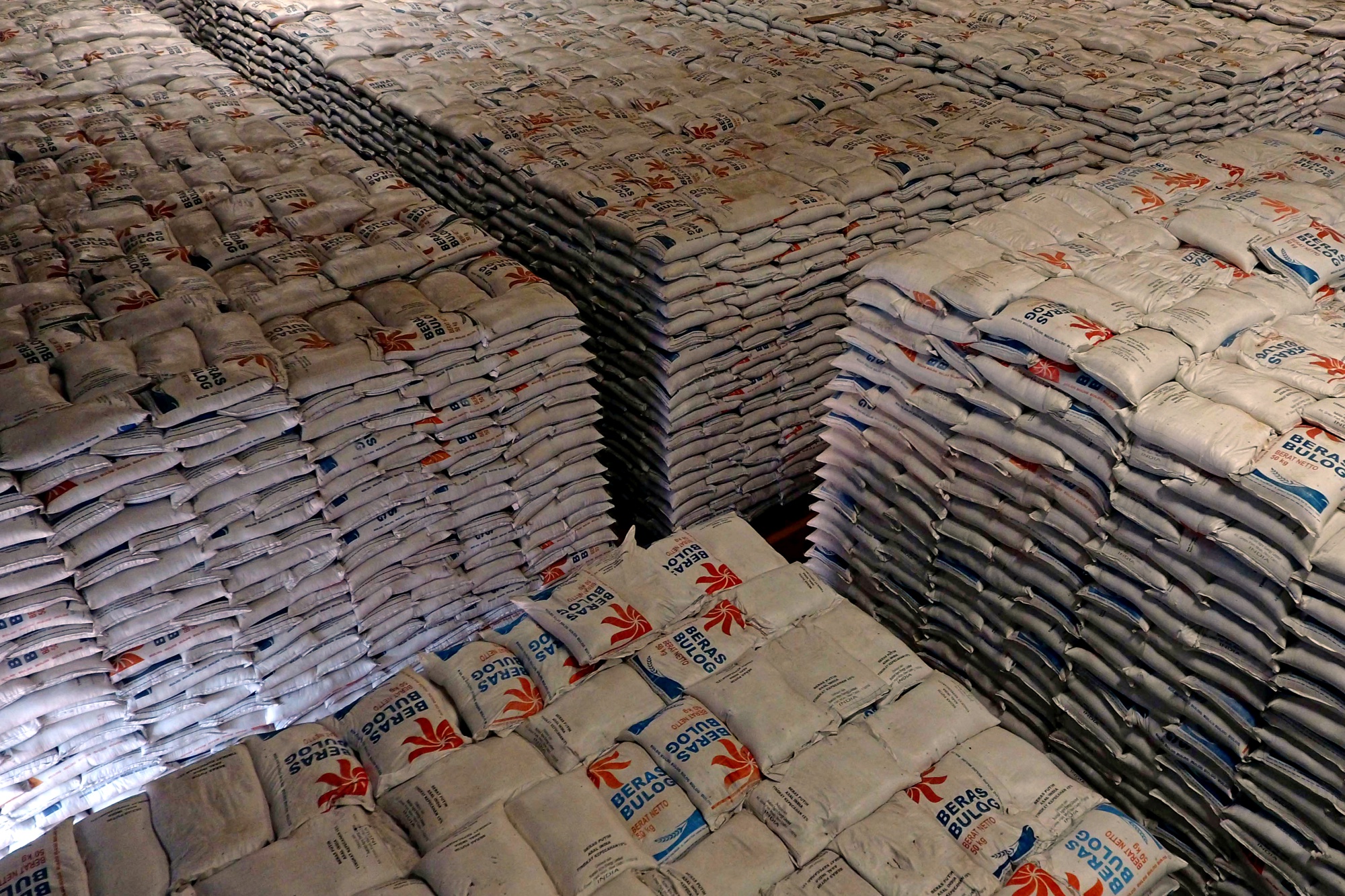 Sacks of rice at a warehouse in Indonesia.